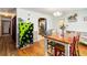 Dining room with hardwood floors, featuring direct kitchen access at 1176 Cardinal Ne Rd, Conyers, GA 30012