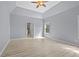 Spacious main bedroom featuring vaulted ceiling and ample natural light at 2595 Glaramara Ter, Cumming, GA 30041