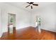 Bright living room featuring gleaming hardwood floors and fresh white walls at 3288 Dogwood St, Atlanta, GA 30337