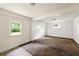 Spacious living room with carpeting, neutral walls, and lots of natural light at 3288 Dogwood St, Atlanta, GA 30337
