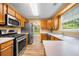 Spacious kitchen featuring stainless steel appliances and quartz countertops at 5535 Dorsett Shoals Rd, Douglasville, GA 30135