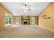 Bright living room with a vaulted ceiling, stone fireplace, and views to the screened patio at 5535 Dorsett Shoals Rd, Douglasville, GA 30135