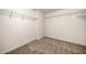 Spacious walk-in closet providing ample storage space with shelving at 5535 Dorsett Shoals Rd, Douglasville, GA 30135