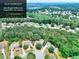 Aerial view of property; 0.75 acres in Loganville, GA, showing surrounding neighborhood and lush tree cover at 662 Shady Willow Ln, Loganville, GA 30052