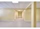 Spacious basement area featuring tile floors, neutral paint, and ample room for customization at 662 Shady Willow Ln, Loganville, GA 30052