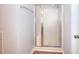 Enclosed shower with glass sliding doors and ceramic tile flooring at 662 Shady Willow Ln, Loganville, GA 30052