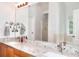 Bathroom features double sinks, granite countertop, and a large mirror at 662 Shady Willow Ln, Loganville, GA 30052