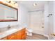 Bathroom with granite countertops, vanity and shower with tub at 662 Shady Willow Ln, Loganville, GA 30052