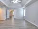 Spacious bedroom with a vaulted ceiling, wood floors, and natural light at 662 Shady Willow Ln, Loganville, GA 30052