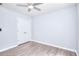 Clean bedroom with hardwood floors and closet at 662 Shady Willow Ln, Loganville, GA 30052