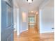Bright foyer featuring hardwood floors, neutral walls, and decorative niche at 662 Shady Willow Ln, Loganville, GA 30052
