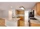 Bright kitchen with stainless steel appliances, granite countertops, and wood cabinets at 662 Shady Willow Ln, Loganville, GA 30052