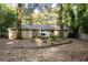 Relaxing backyard with outdoor furniture, perfect for enjoying the peaceful surroundings at 118 Lucia Dr, Smyrna, GA 30082
