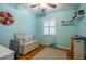 Comfortable bedroom with bench, desk and hardwood floors, offering a peaceful retreat at 118 Lucia Dr, Smyrna, GA 30082
