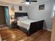 Cozy bedroom with hardwood floors, ceiling fan and comfortable bed at 118 Lucia Dr, Smyrna, GA 30082