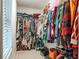 Walk-in closet with organized storage, ideal for clothes, shoes, and accessories at 118 Lucia Dr, Smyrna, GA 30082