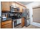 Well-equipped kitchen with stainless steel appliances and granite countertops at 118 Lucia Dr, Smyrna, GA 30082