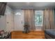 Inviting living room showcasing a front door and hardwood flooring at 118 Lucia Dr, Smyrna, GA 30082