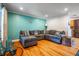 Spacious living room featuring wood floors, ample seating, and a stylish design at 118 Lucia Dr, Smyrna, GA 30082