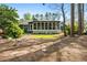 Large backyard with patio and mature trees at 1691 Whitlock Rd, Marietta, GA 30066