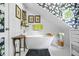 Stylish bathroom with floral wallpaper, a standalone tub and black and white floor tiles at 1691 Whitlock Rd, Marietta, GA 30066