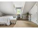 Bedroom featuring a desk, white walls, and natural light at 1691 Whitlock Rd, Marietta, GA 30066