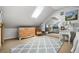 Attic bedroom featuring natural light and a large rug at 1691 Whitlock Rd, Marietta, GA 30066