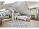 Attic bedroom features a desk area, white walls, and natural light at 1691 Whitlock Rd, Marietta, GA 30066