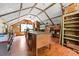 Bonus room with wood floors, exposed beam ceiling, windows and built in storage at 1691 Whitlock Rd, Marietta, GA 30066