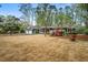 Charming home with well-maintained lawn and colorful flowering bushes at 1691 Whitlock Rd, Marietta, GA 30066