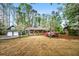 Charming home with well-maintained lawn and colorful flowering bushes at 1691 Whitlock Rd, Marietta, GA 30066