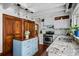 Bright kitchen features stainless steel appliances, granite countertops, a cozy island, and ample storage at 1691 Whitlock Rd, Marietta, GA 30066
