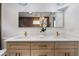 Bathroom showcasing double vanities, modern lighting, and fixtures at 2001 Swazey Dr, Decatur, GA 30032