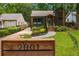 Charming home with a modern exterior, well-manicured lawn, and inviting entryway at 2001 Swazey Dr, Decatur, GA 30032