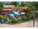 Spacious restaurant patio with numerous tables and umbrellas, perfect for outdoor dining at 2001 Swazey Dr, Decatur, GA 30032