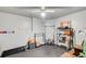 Unfinished basement space with neutral walls and carpeting, with areas for storage at 1360 Stampmill Way, Lawrenceville, GA 30043