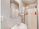 A clean bath with shower, sink, and medicine cabinet offers convenience at 1360 Stampmill Way, Lawrenceville, GA 30043
