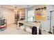 This bedroom features custom shelving for storage and a large workspace or hobby area at 1360 Stampmill Way, Lawrenceville, GA 30043