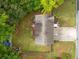 Aerial view of a home with a spacious backyard, wooden deck, and well-maintained lawn at 1620 Cedar Hl, Douglasville, GA 30134