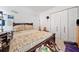 Bedroom featuring a dark bed and a closet with paneled doors at 1620 Cedar Hl, Douglasville, GA 30134