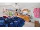 Bright bedroom with a vaulted window, dresser and ample natural light at 1620 Cedar Hl, Douglasville, GA 30134