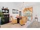 Elegant dining room featuring a chandelier, neutral color palette, table set for four and decorative accents at 1620 Cedar Hl, Douglasville, GA 30134