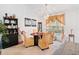 Elegant dining room with chandelier, display cabinet, and large window at 1620 Cedar Hl, Douglasville, GA 30134