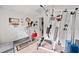 Home gym area with a treadmill and a multi-station weight machine for convenient fitness at 1620 Cedar Hl, Douglasville, GA 30134
