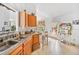 An ample kitchen with wooden cabinets and stainless steel sink at 1620 Cedar Hl, Douglasville, GA 30134