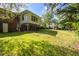 Spacious backyard with a manicured lawn, offering plenty of space for outdoor activities and relaxation at 3055 Henderson Mill Rd, Atlanta, GA 30341