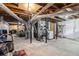 Unfinished basement providing ample storage with exposed ductwork and utilities at 3055 Henderson Mill Rd, Atlanta, GA 30341