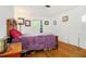 Bedroom with hardwood floors, natural light, and minimal decor at 3055 Henderson Mill Rd, Atlanta, GA 30341