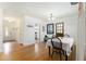This dining area showcases the hardwood floors, access to hall and kitchen, and a table for four at 3055 Henderson Mill Rd, Atlanta, GA 30341