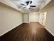 Spacious basement area with wood flooring, ceiling fan, and neutral walls, perfect for flexible living at 107 Oconnor Dr, Dallas, GA 30157
